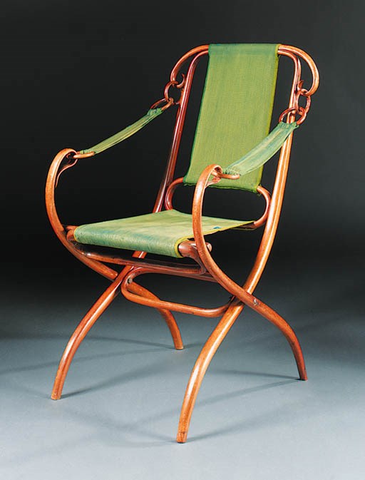A bentwood and canvas folding chair