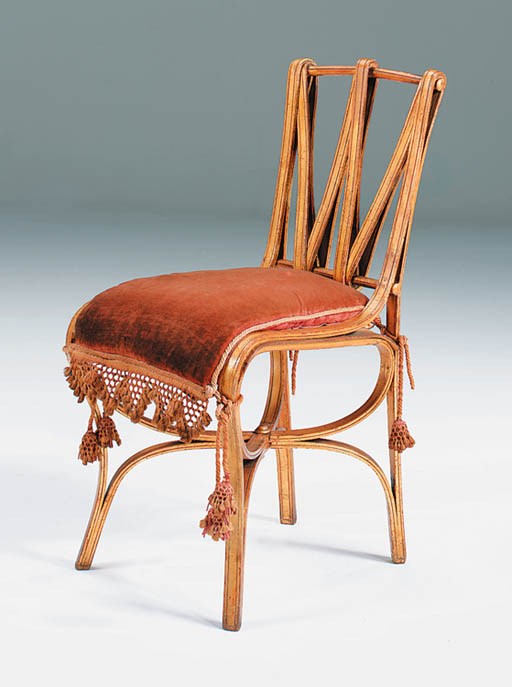 A gilded bentwood side chair