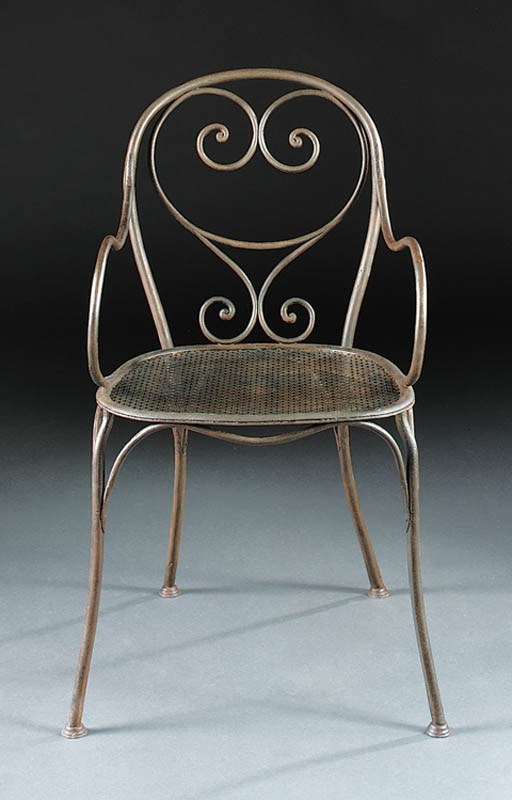 A wrought iron armchair