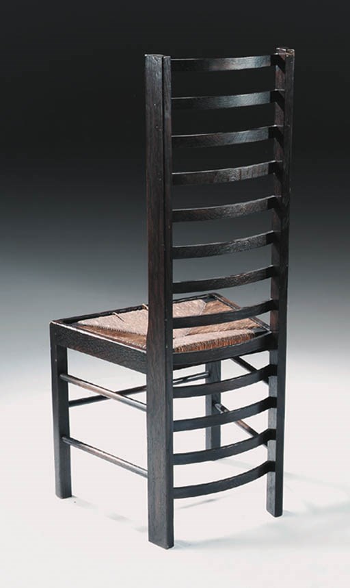 An ebonised oak ladderback chair