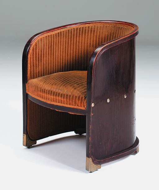 A stained beech bentwood tub chair