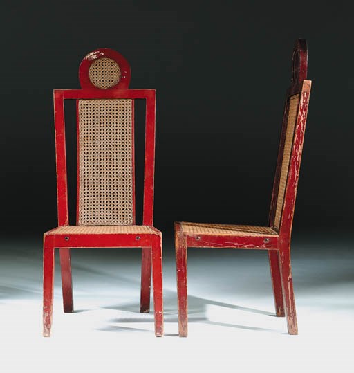 A pair of Omega Workshops red-painted armchairs