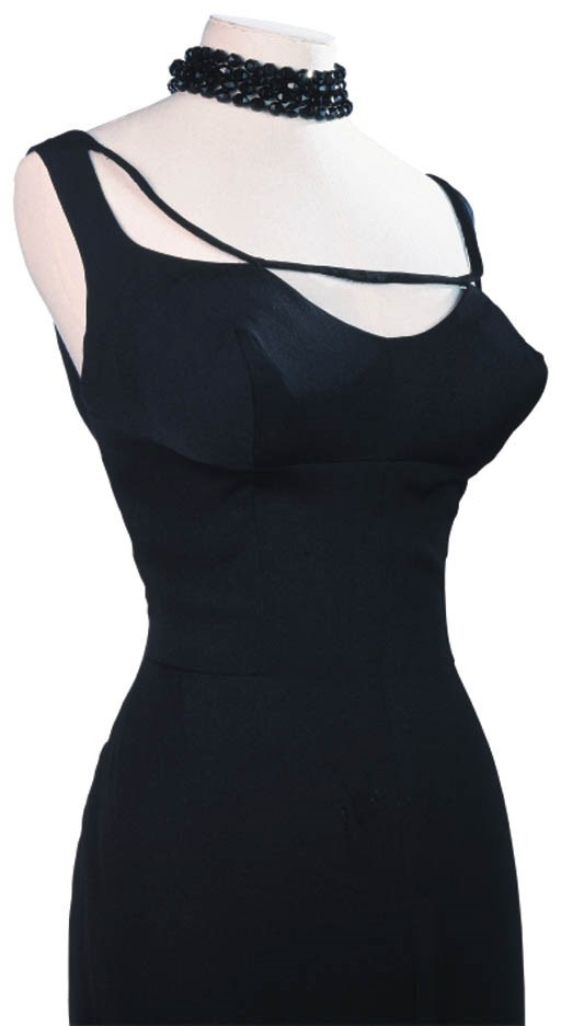 A SLEEVELESS COCKTAIL DRESS