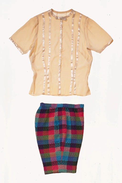 A PAIR OF SHORTS AND TWO SHIRTS