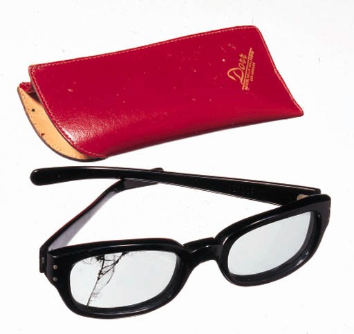 A PAIR OF SUNGLASSES