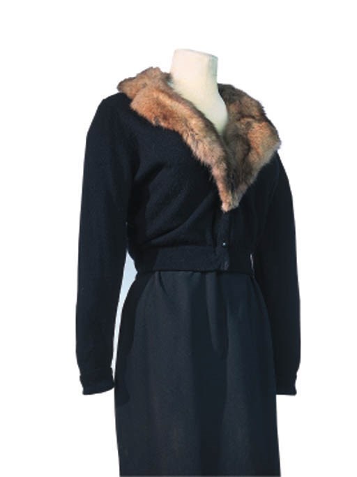 A CARDIGAN Of black cashmere, trimmed with a natural Russian sable collar, labelled Jay Thorpe, New York.
