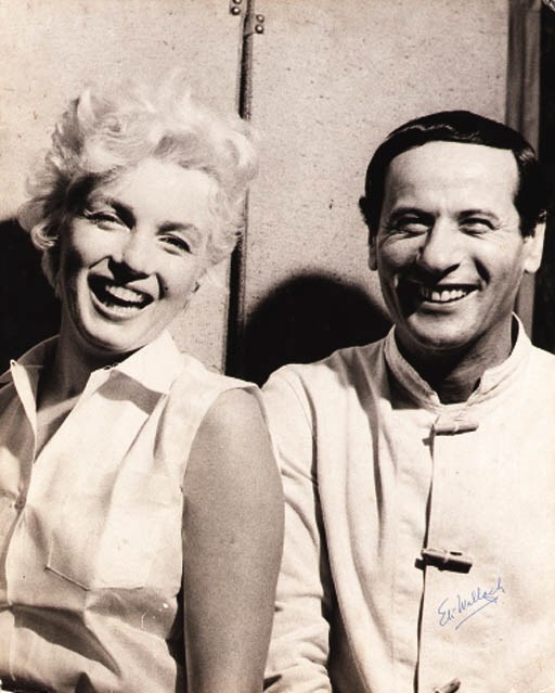 A PHOTOGRAPH OF MARILYN MONROE AND ELI WALLACH