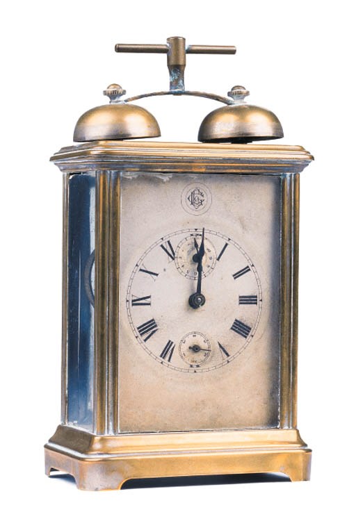 A BRASS-PLATED NICKEL CARRIAGE CLOCK
