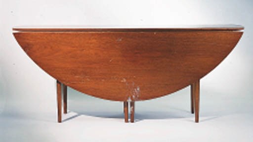 A SCANDINAVIAN STYLE MAHOGANY DROP-LEAF TABLE