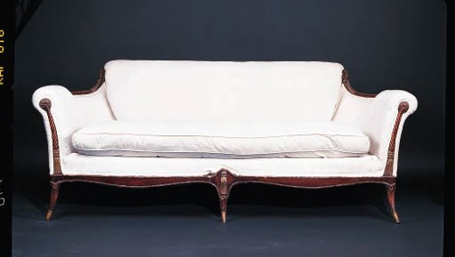 AN UPHOLSTERED SOFA