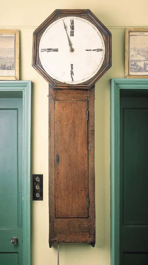 An oak drop-dial wall timepiece