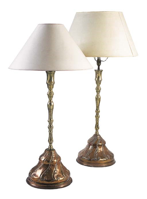 A matched pair of Ottoman Turkish brass and copper candlesticks