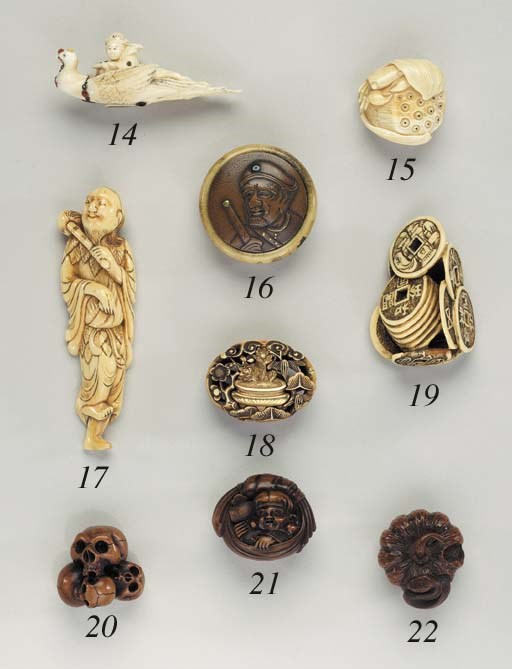 A Stag's Horn and Metal Kagamibuta Netsuke, an Ivory and Metal Kagamibuta Netsuke and a Lacquered-Wood Netsuke**