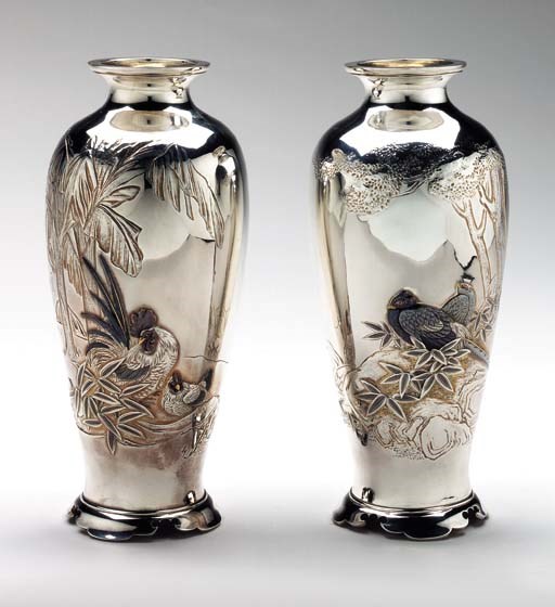 A Pair of Silver Vases