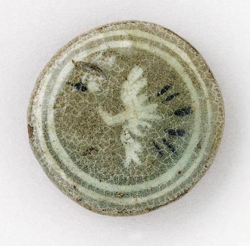 An Inlaid Celadon Fitting