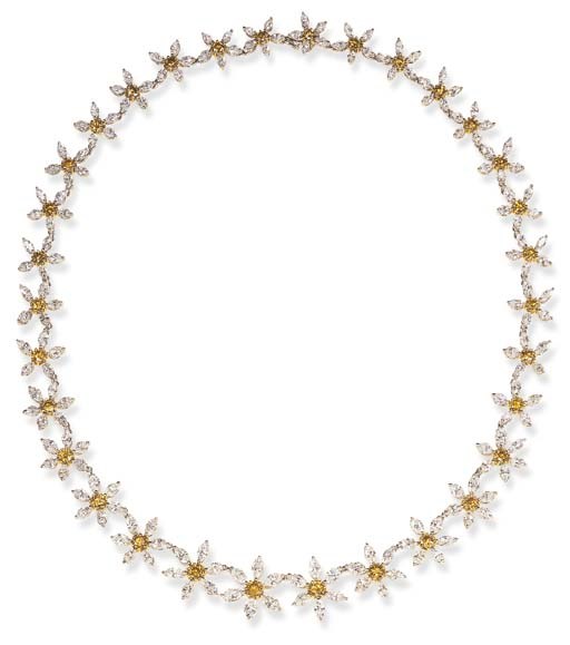 AN ELEGANT DIAMOND AND YELLOW DIAMOND NECKLACE