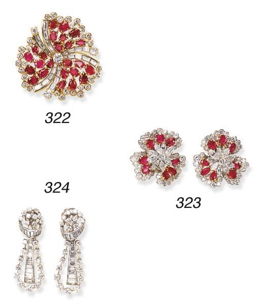 A RUBY AND DIAMOND FLOWER BROOCH