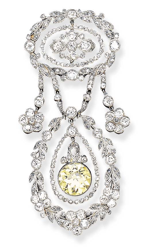 AN EXQUISITE BELLE EPOQUE DIAMOND AND FANCY YELLOW DIAMOND BROOCH, BY CARTIER