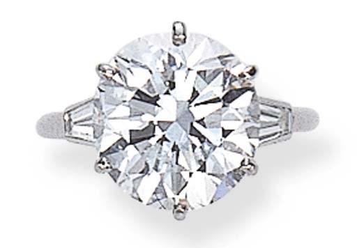 A FINE SINGLE-STONE DIAMOND RING, BY CARTIER