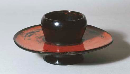 A Black and Red Negoro Stand for a Temmoku Tea Bowl