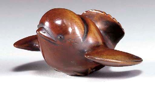 A Wood Netsuke and a Fruit-Nut Netsuke