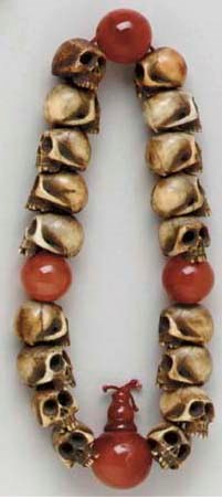 A Strand of Staghorn Ojime and Glass Prayer Beads