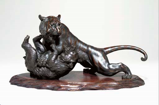 A Bronze Model of a Tiger and Bear