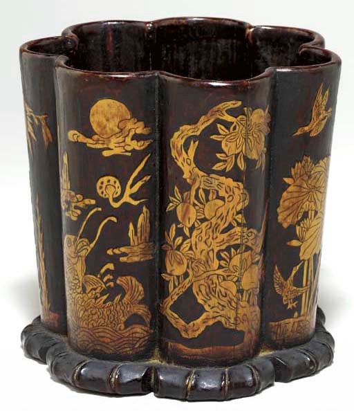A Carved and Stained Bamboo Brush Holder