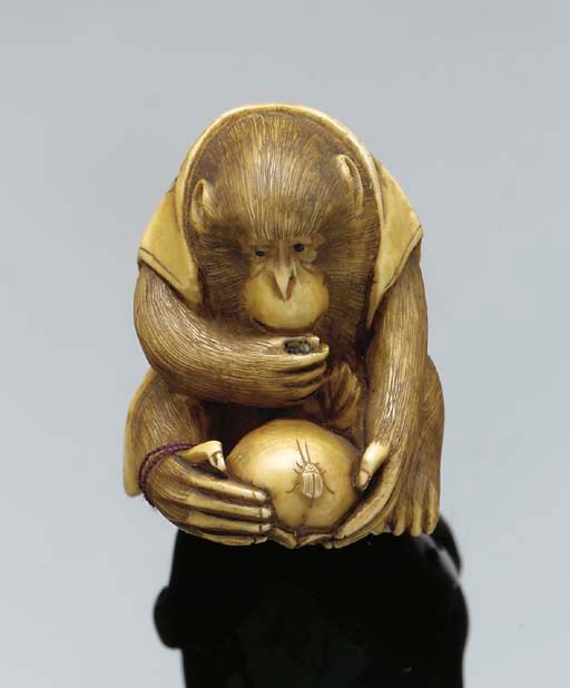 A Japanese ivory netsuke of a monkey, 19th Century