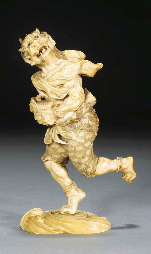 A Japanese ivory okimono of an oni, 19th Century