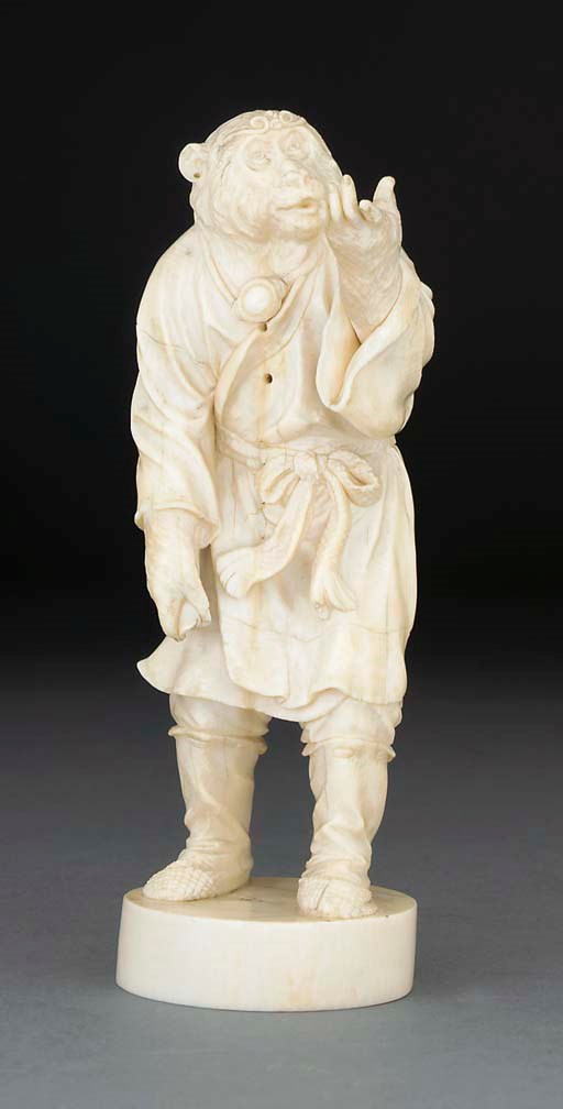 A Japanese ivory okimono of a monkey figure, 19th Century