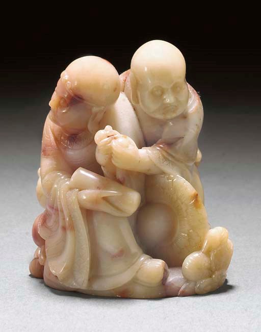 A Chinese soapstone group, early 19th Century