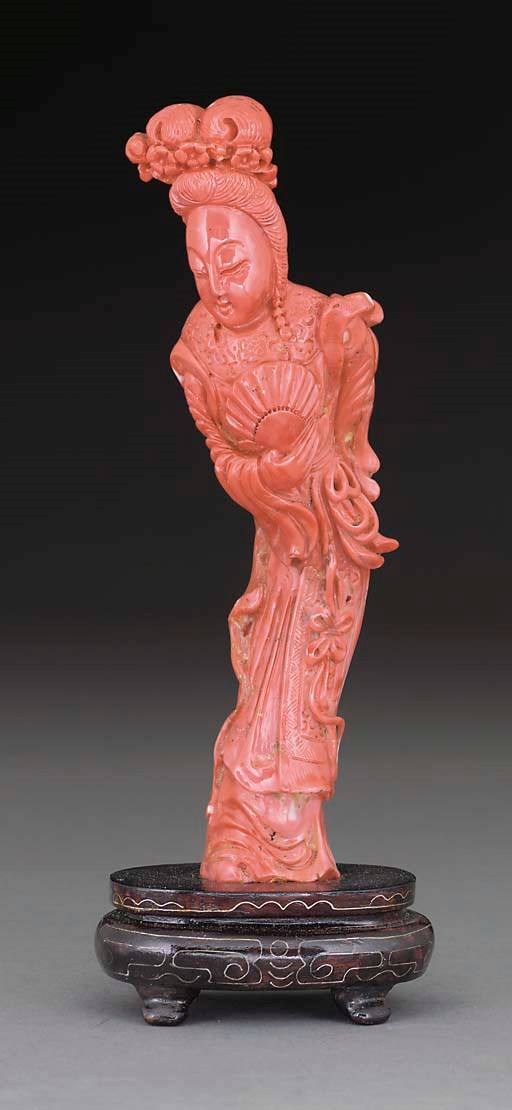 A Chinese coral carved model of Guanyin, 19th Century
