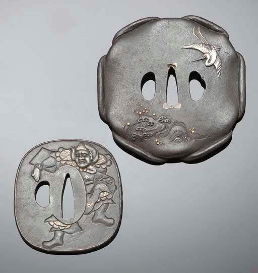 Two Japanese inlaid iron tsuba's, 19th century