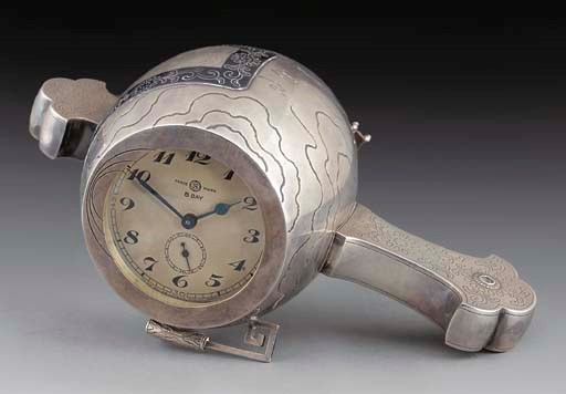 A Japanese silver model of Daikoku's mallet with inset clock, Meiji Period