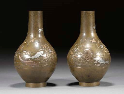A pair of Japanese bronze pear shaped vases, 19th century