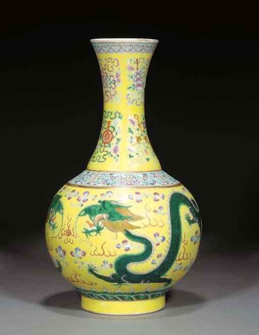 A Chinese famille rose bottle vase, iron red six character Guangxu mark and of the period