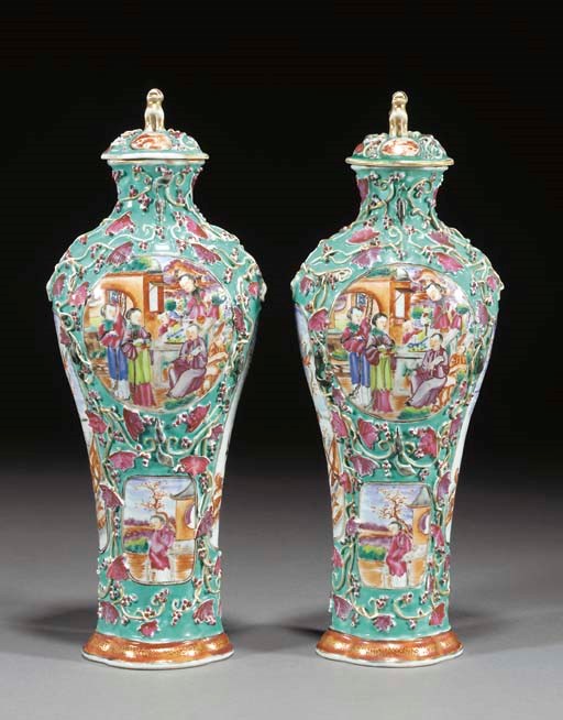 A pair of Chinese famille rose mandarin pattern flattened vases and covers, 18th Century