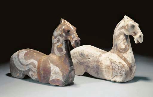 A pair of Chinese painted buff pottery horses, Han Dynasty