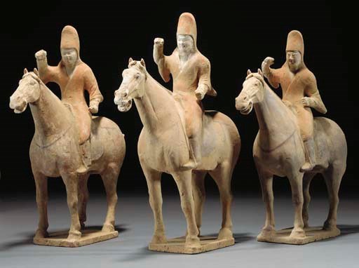 Three Chinese painted pottery equestrian figures, Tang dynasty