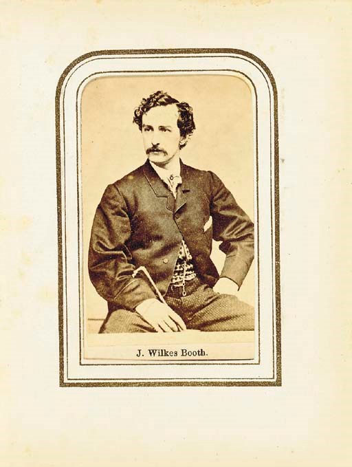 [BOOTH, John Wilkes]. An album of photographic portraits (cartes-de-visite), containing EIGHT DIFFERENT CARTES of the actor and assassin, plus cartes of Lt. General WINFIELD SCOTT(1786-1866), Secretary of State WILLIAM H. SEWARD (1801-1872), Secretary of War EDWIN M. STANTON (1814-1869), the  actress LAURA KEENE (1826-1873), who appeared in Our American Cousin at Ford's Theatre on the night of Lincoln's assassination). N.p., n.d. [evidently assembled 1863-65?].