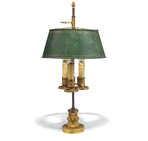 A LOUIS XVI ORMOLU THREE-LIGHT LAMPE BOUILLOTTE