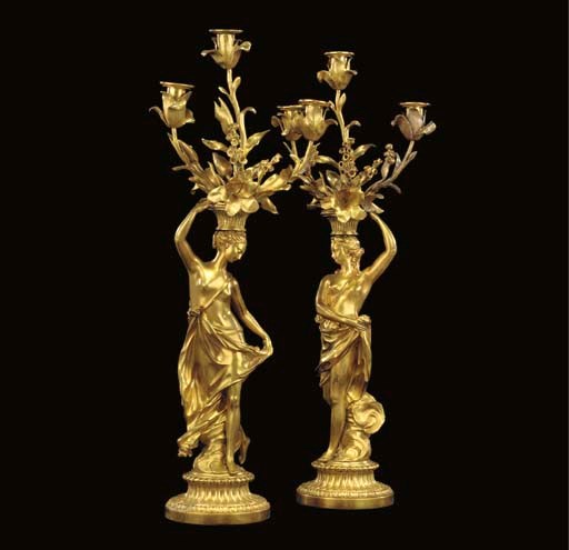 A PAIR OF LATE LOUIS XVI ORMOLU THREE-LIGHT CANDELABRA