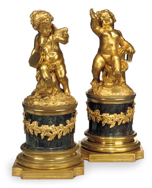A PAIR OF LOUIS XVI ORMOLU AND RED SERPENTINE MARBLE GROUPS