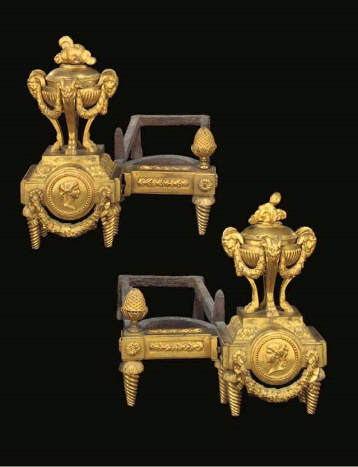 A PAIR OF LATE LOUIS XV ORMOLU CHENETS