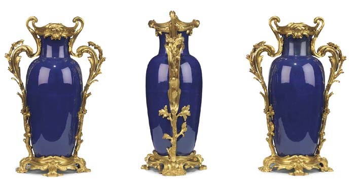 A PAIR OF LOUIS XV ORMOLU-MOUNTED BLUE PORCELAIN VASES