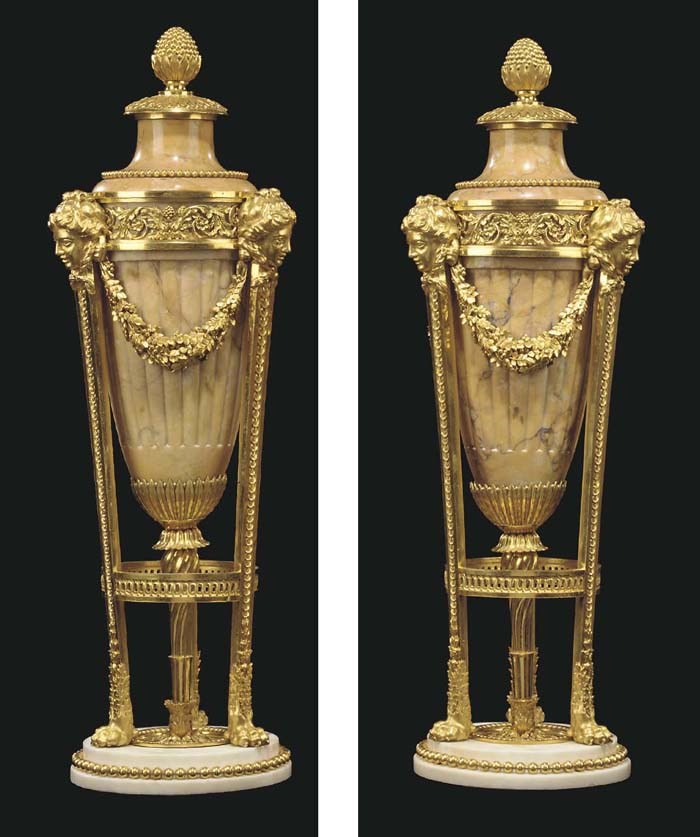A PAIR OF LOUIS XVI ORMOLU AND SIENA MARBLE VASES AND COVERS