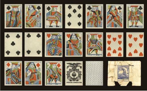American Manufacture "Steamboat" Deck, circa 1850, New York, James J. Levy (?), 52 of 52 cards. Full-length courts, no indices, square corners. Ace has ribbon that reads, "E Pluribus Unum," and "American Manufacture." Backs are snowflakes in blue. Includes scarce original wrapper. Wrapper has some loss, cards in generally fine condition. Rare. Dawson, 50, NY17a.