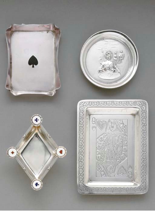 FOUR SILVER ASHTRAYS.
