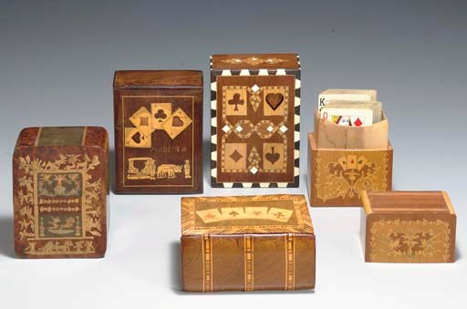 FIVE WOODEN DOUBLE DECK PLAYING CARD HOLDERS, CIRCA 19TH AND EARLY 20TH CENTURIES.